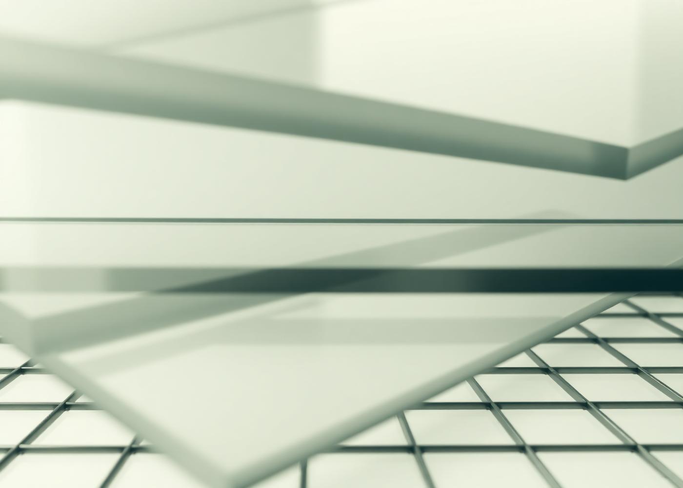 Layered translucent glass planes above a grid, an abstract representation of system architecture layers